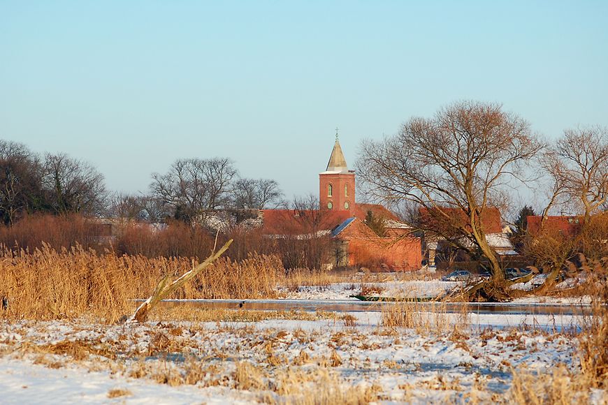 Winterlandschaft mit Dorf